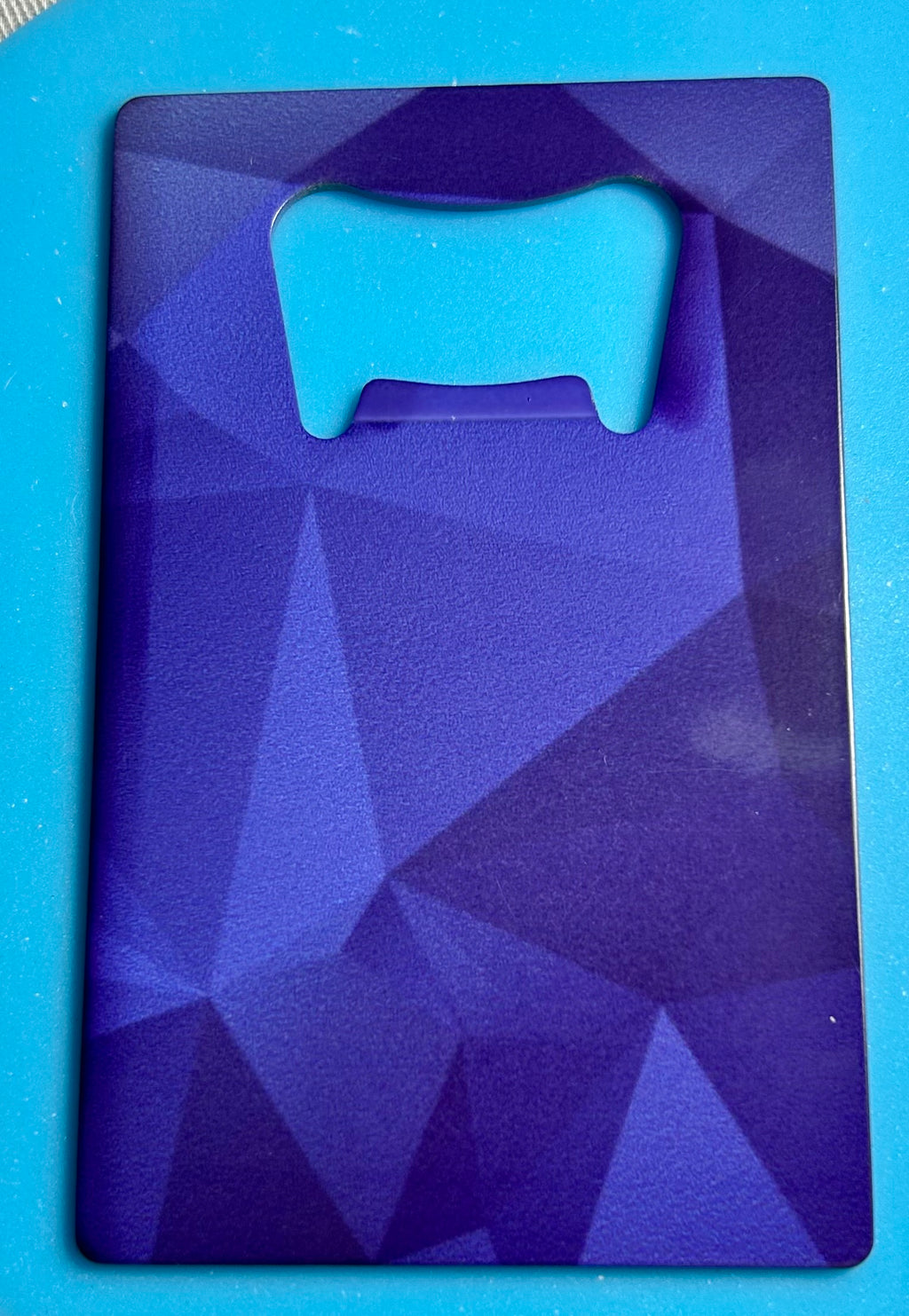 Ouvre-bouteille double face en métal au design élégant