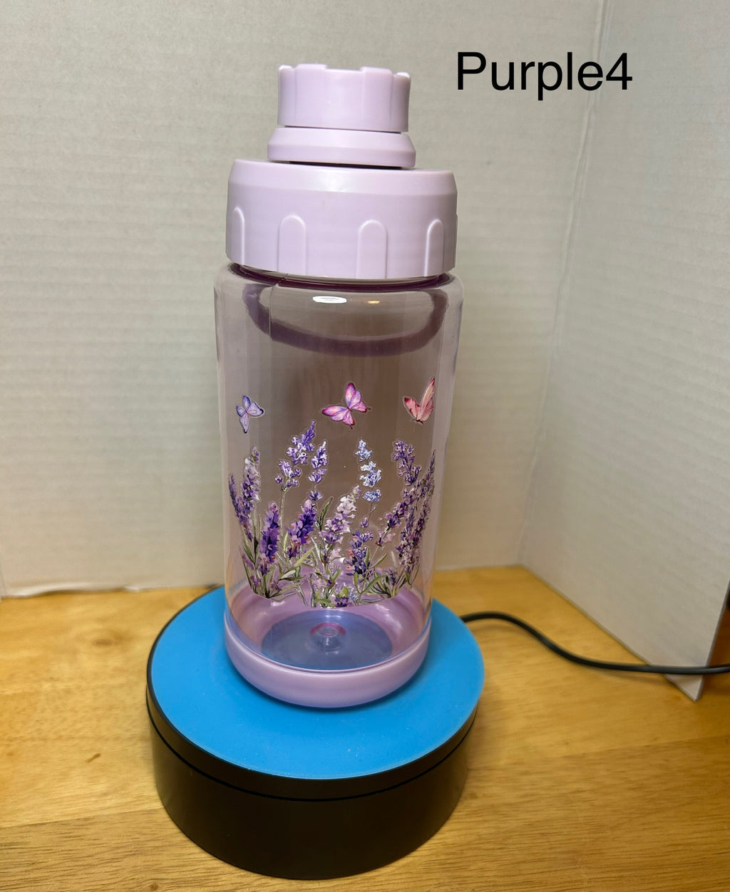 14 oz Plastic Water Bottle with Handle and Screw on Lid featuring a Beautiful Design