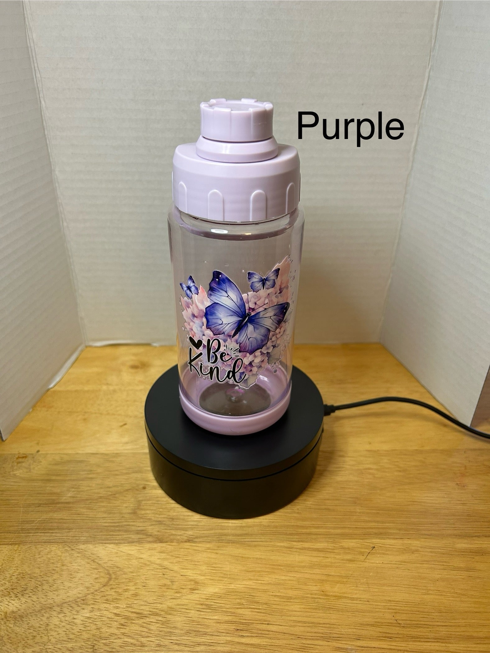 14 oz Plastic Water Bottle with Handle and Screw on Lid featuring a Beautiful Design
