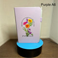 Journal ligné vierge A6 avec un magnifique motif floral/d'inspiration – Violet