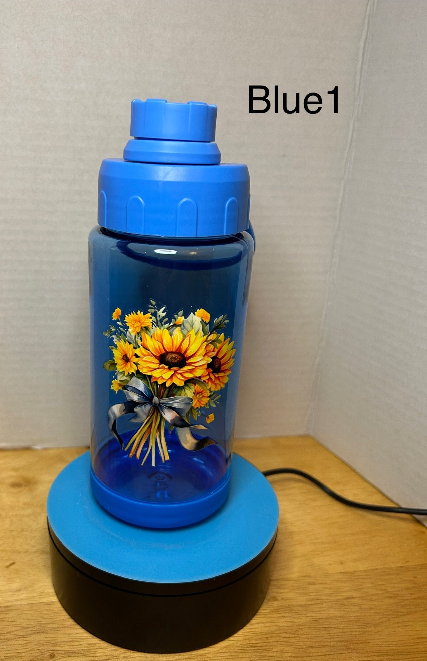 14 oz Plastic Water Bottle with Handle and Screw on Lid featuring a Beautiful Design