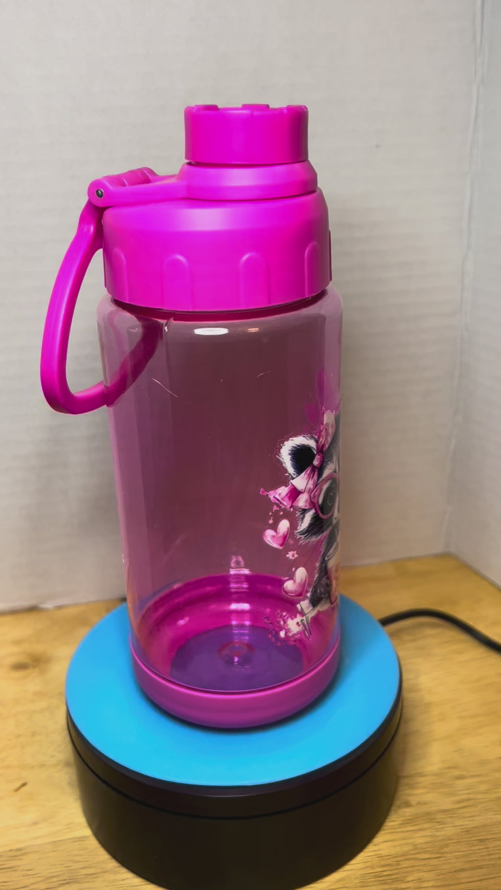 14 oz Plastic Water Bottle with Handle and Screw on Lid featuring a Beautiful Design