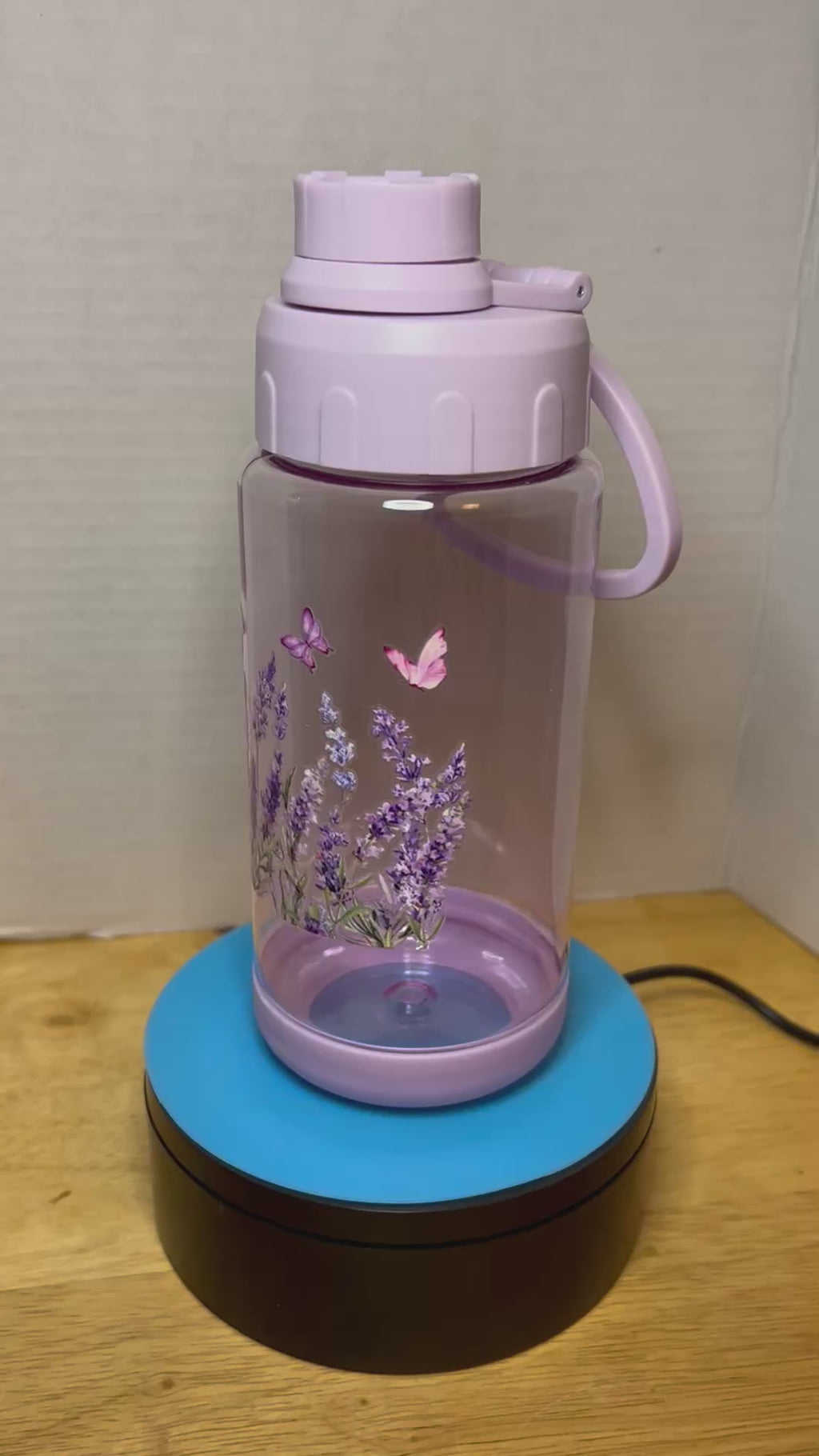 14 oz Plastic Water Bottle with Handle and Screw on Lid featuring a Beautiful Design