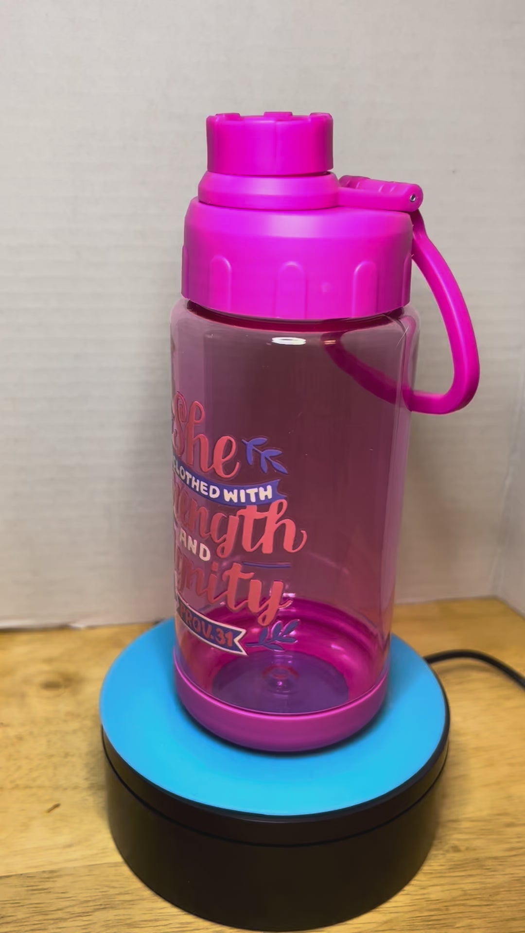 14 oz Plastic Water Bottle with Handle and Screw on Lid featuring a Beautiful Design