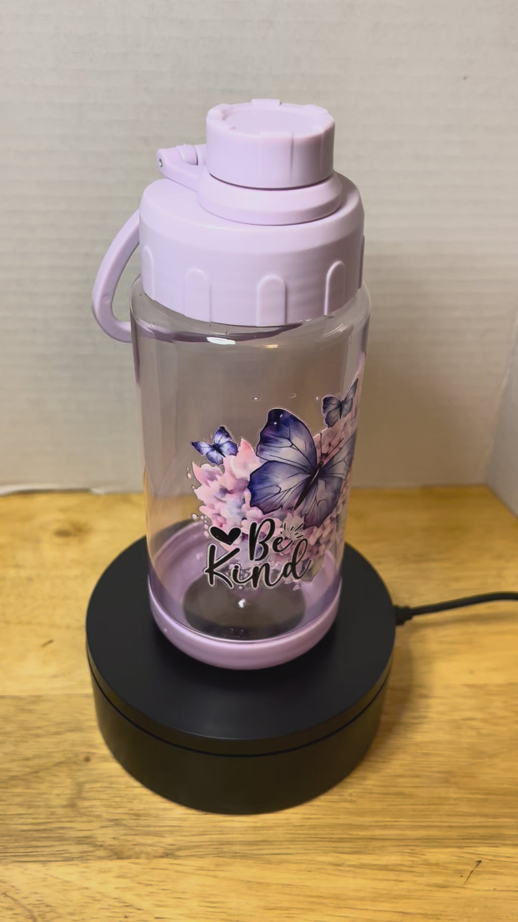 14 oz Plastic Water Bottle with Handle and Screw on Lid featuring a Beautiful Design