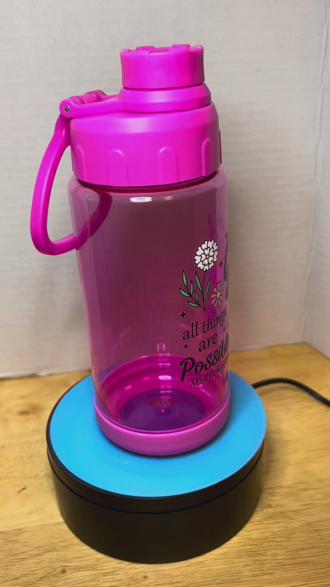 14 oz Plastic Water Bottle with Handle and Screw on Lid featuring a Beautiful Design