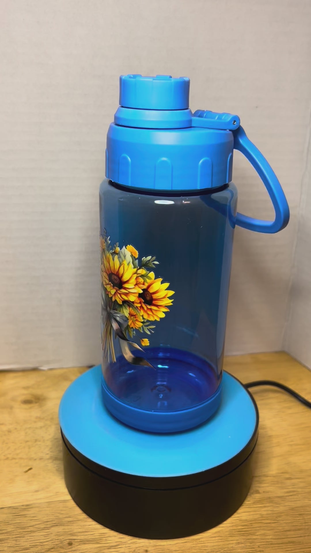 14 oz Plastic Water Bottle with Handle and Screw on Lid featuring a Beautiful Design
